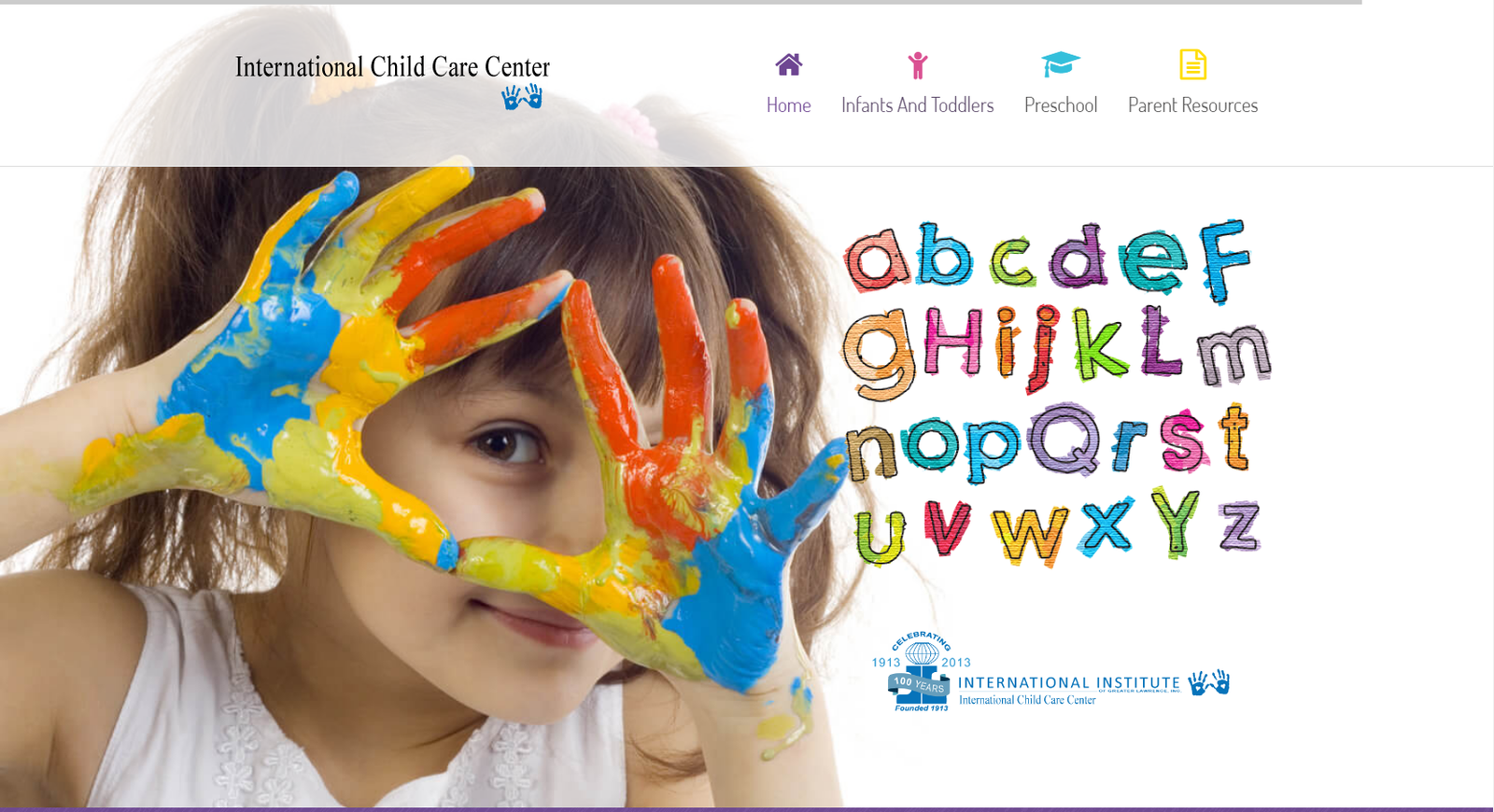 Original International Child Care Center website design, with colorful lettering and a child painting.